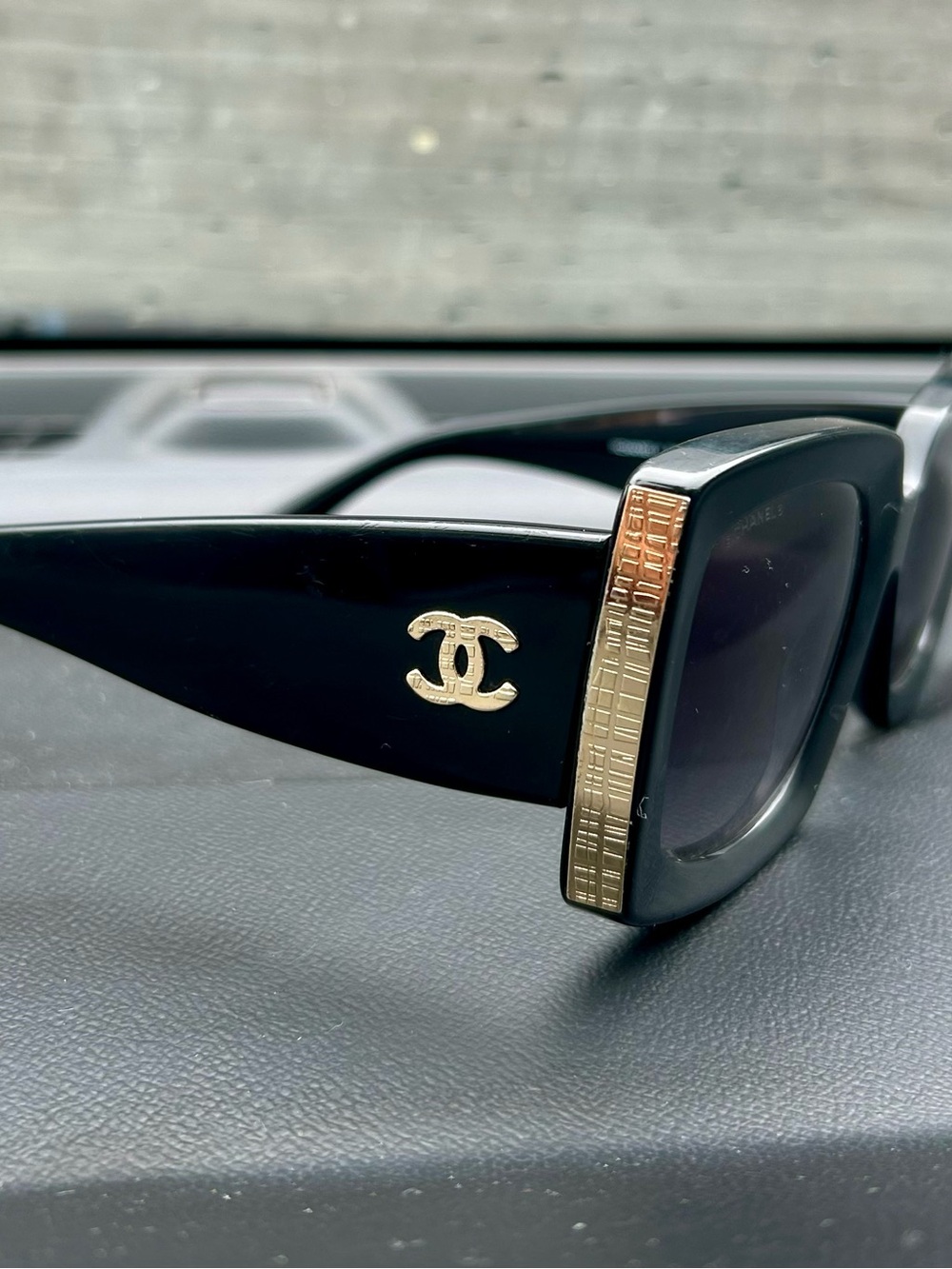 CHANEL Black Sunglasses with Gold Accent